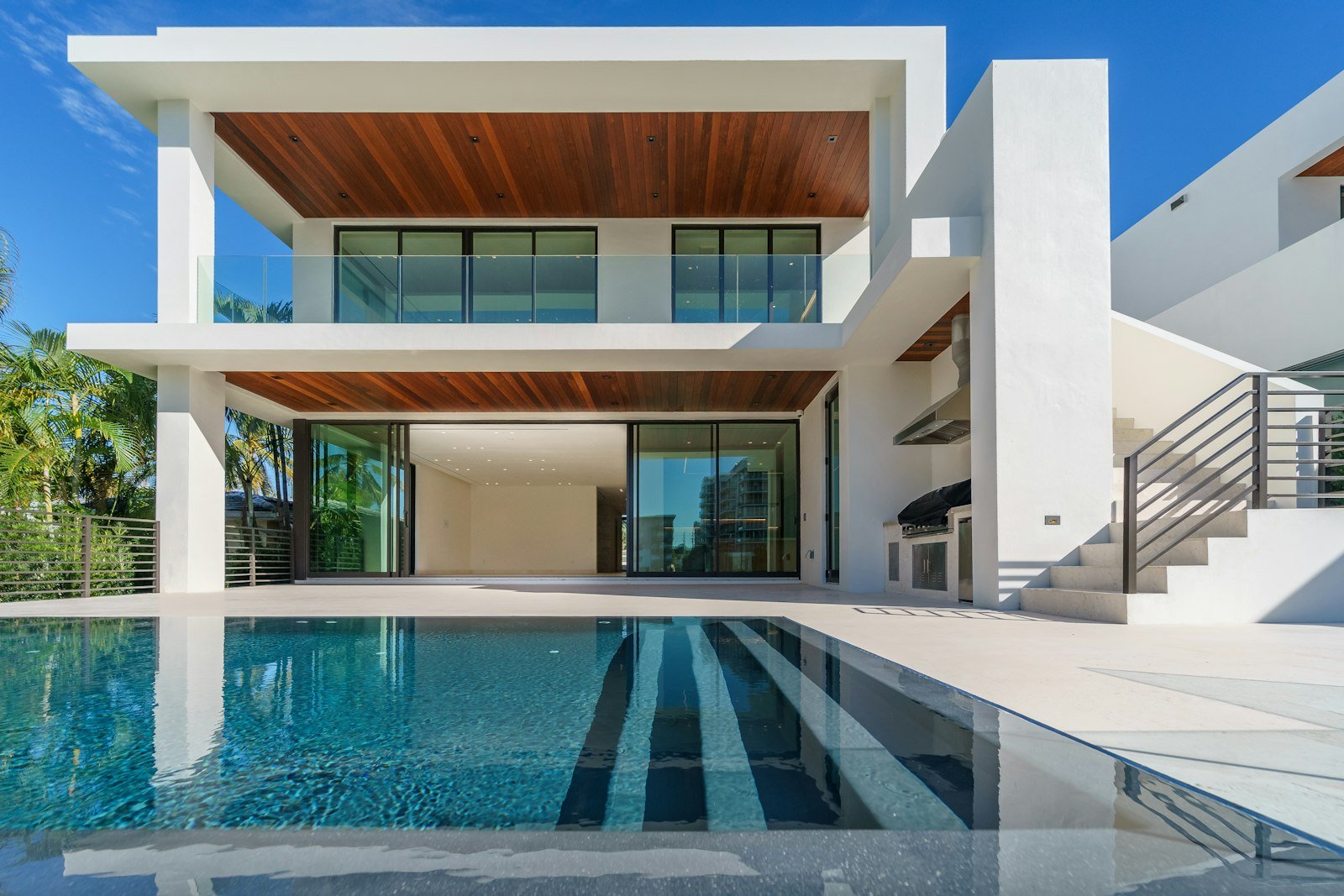 Modern white home with geometric pool