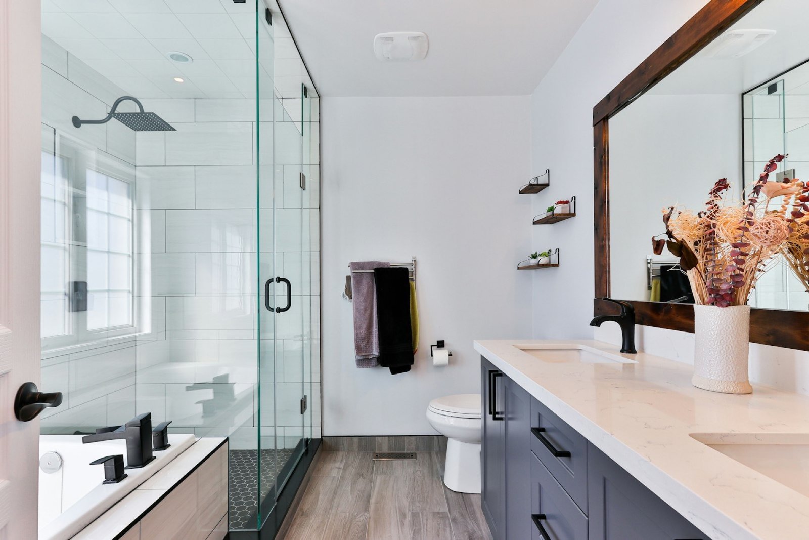 Spa bathroom with porcelain marble surround and matte black fixtures