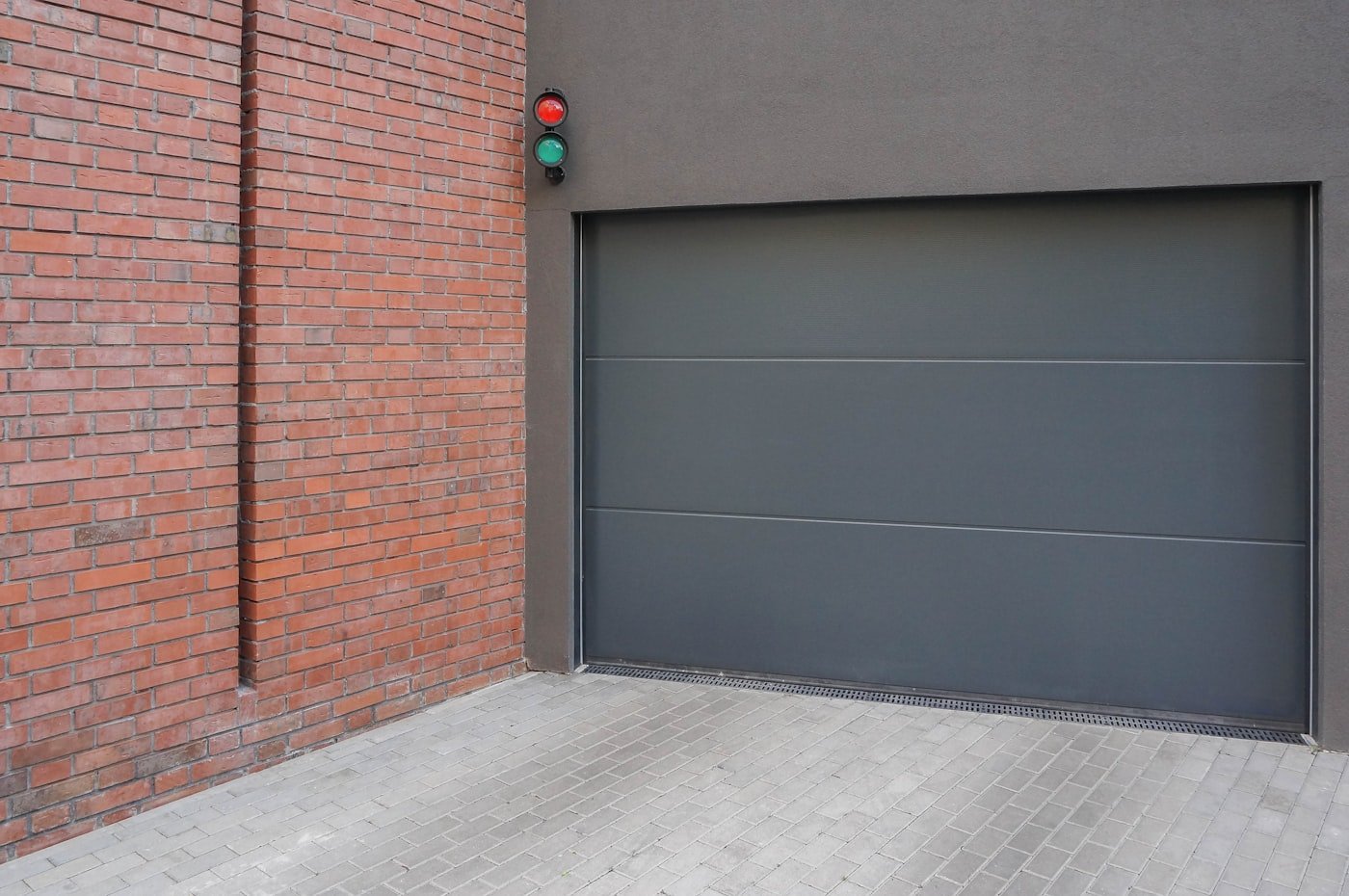 Minimal flush-panel charcoal garage door