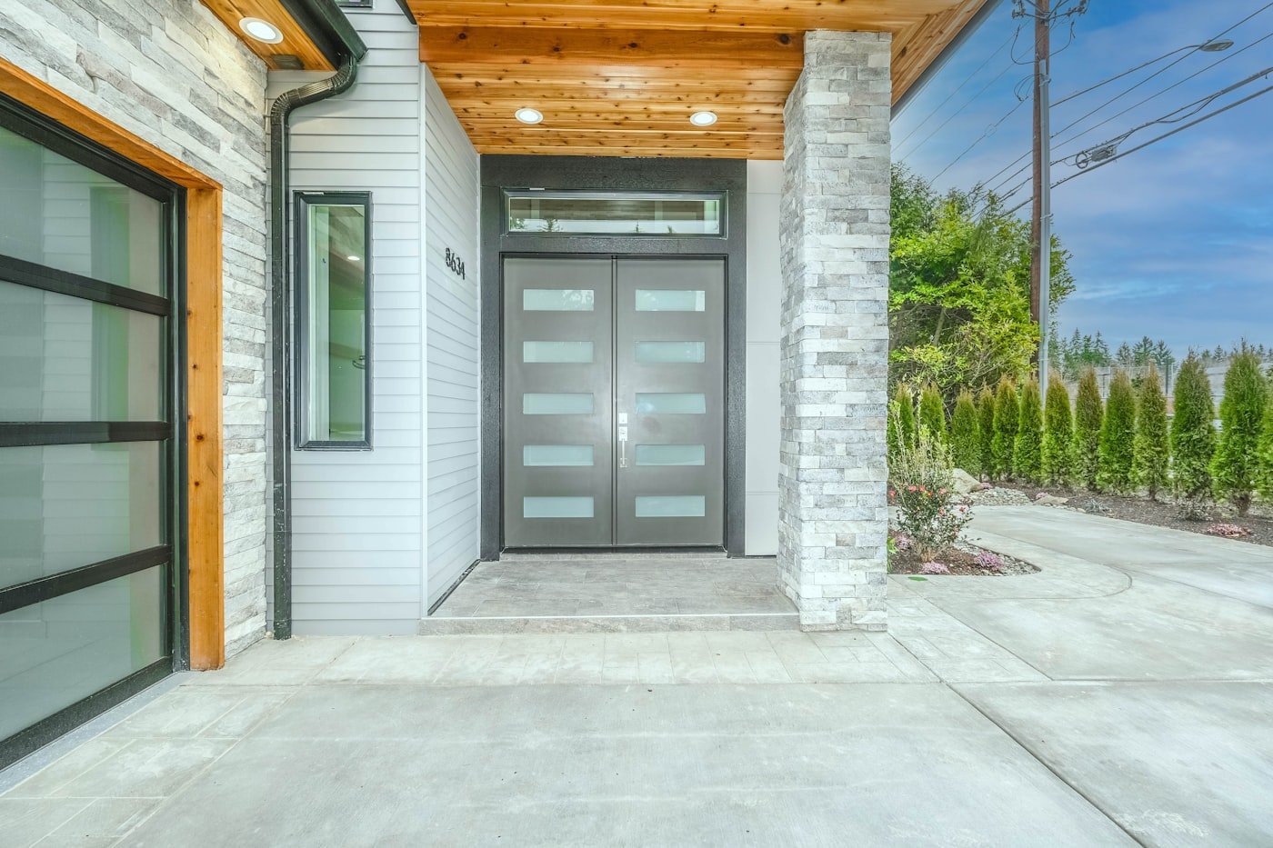 Modern glass entry and garage